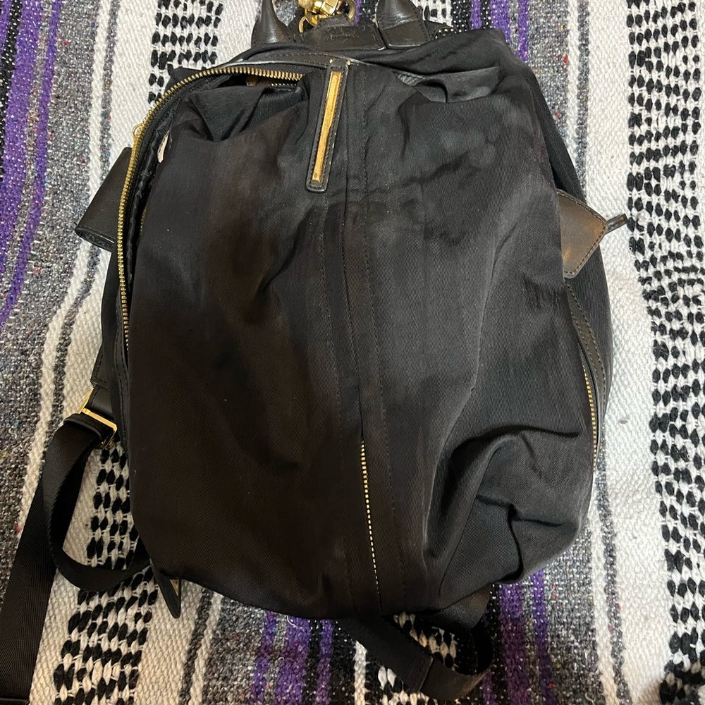 Caraa Women’s Black Leather Backpack with Gold Details